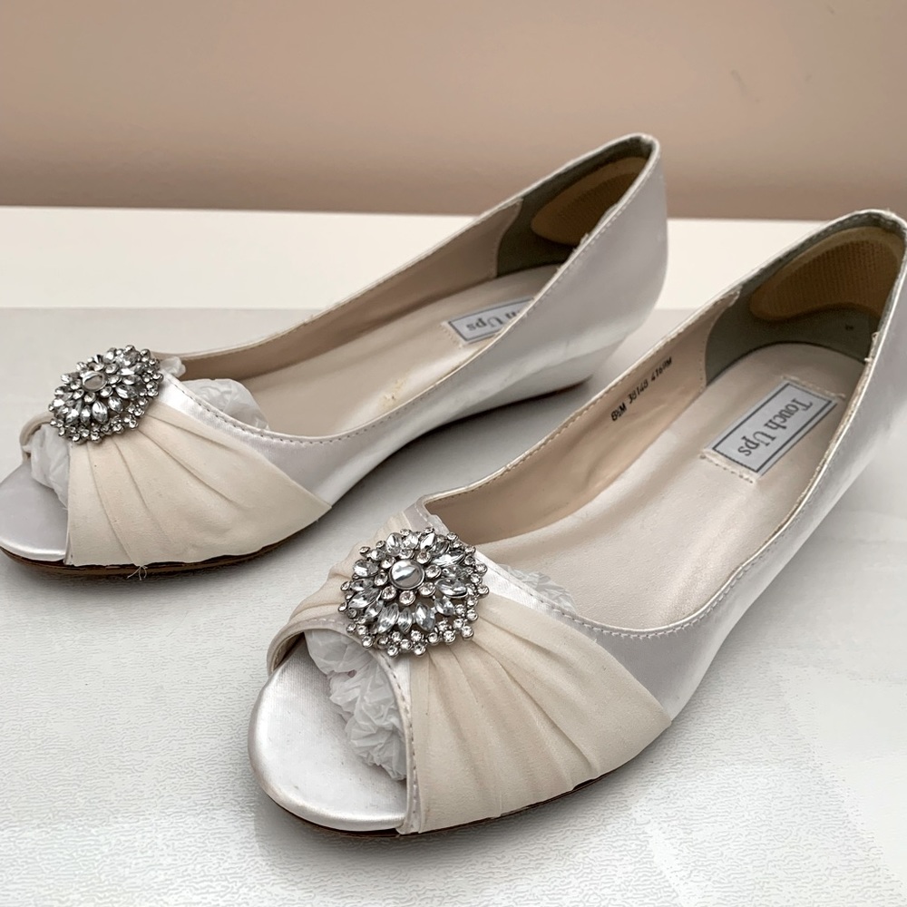 Jeweled peel toe wedge in Silver/White with ivory fabric around toe. 8.5.